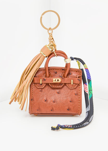 Ashley Stewart Ostrich Effect Tasseled Bag Charm Brown